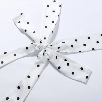 Polka Dot Hourglass Jumpsuit with Corset Belt